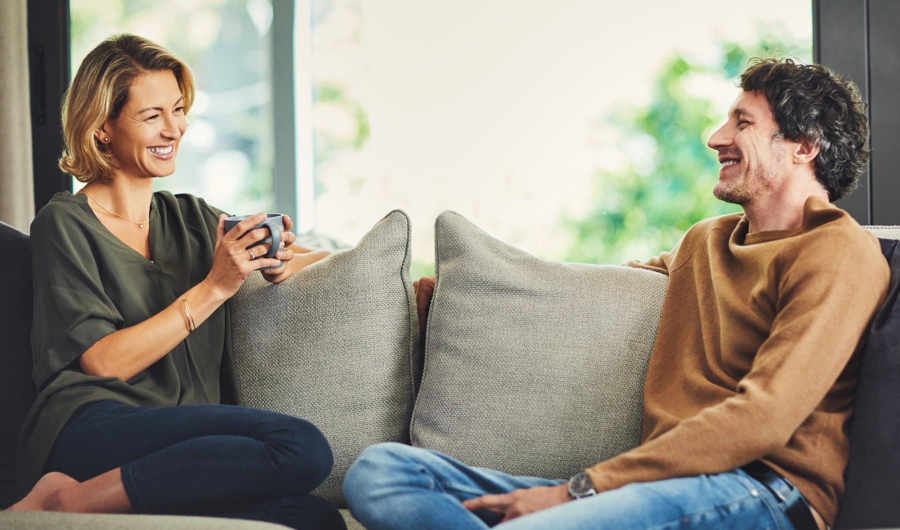 a man and a woman sitting on a couch
